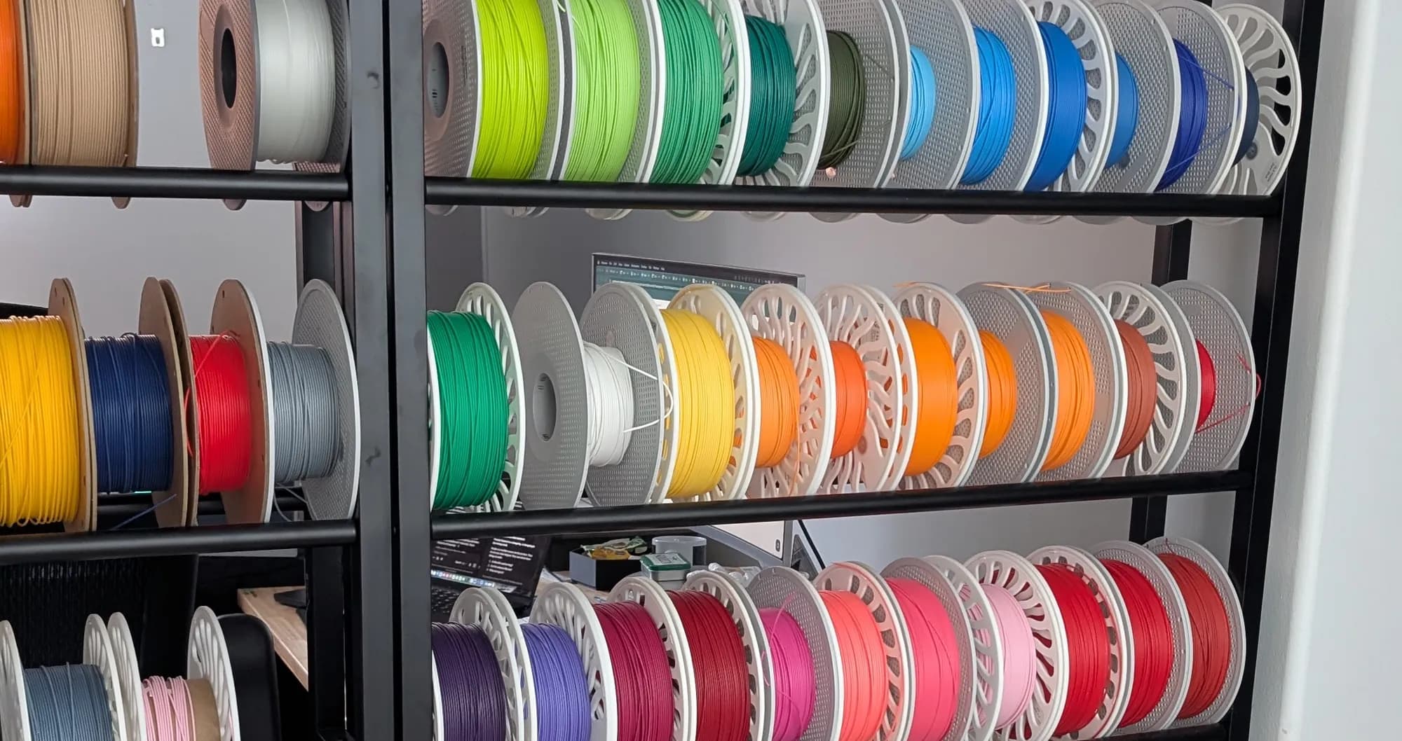 Racks of filament spools in the farm this software runs